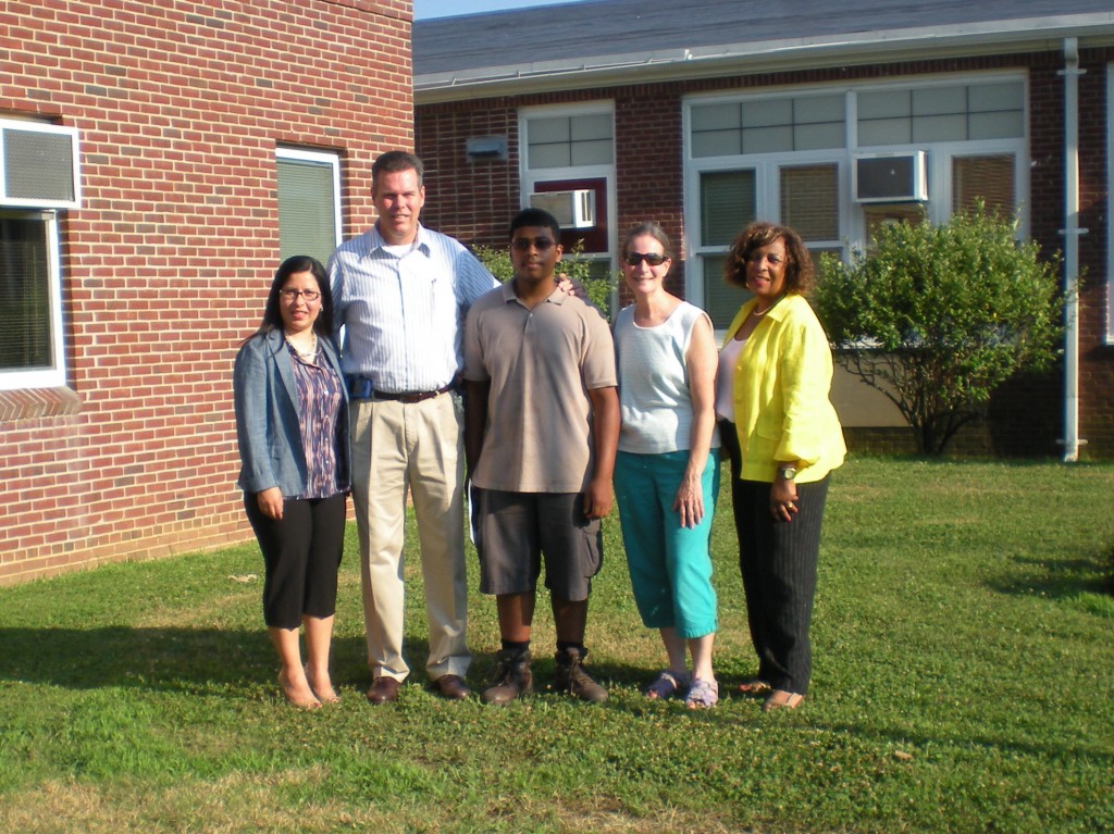 Before groundbreaking. From L-R, Ana Martinez, Board Pres.; Joe Bond, Supt.; Elvin Amadeo; Ellen Edelstein, Hist. Soc. Pres.; Paula Moore, Board Trustee